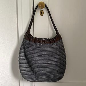 Majo large leather “slouch” bag.